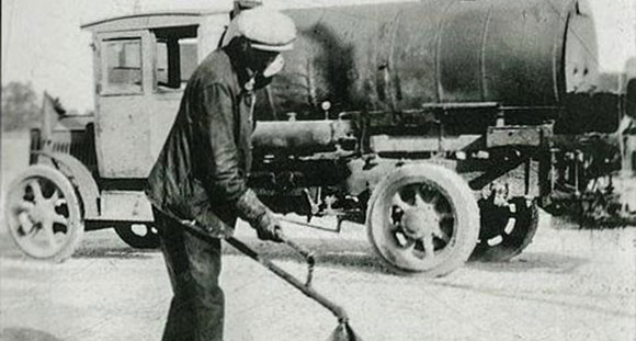 Historic asphalt paving crew showcasing our company New England Asphalt's legacy of quality workmanship